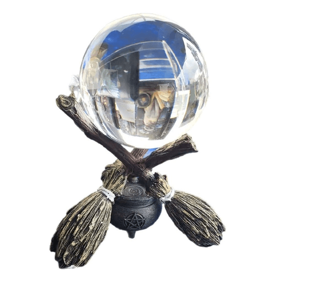 Broomstick crystal ball holder by Nemesis Now